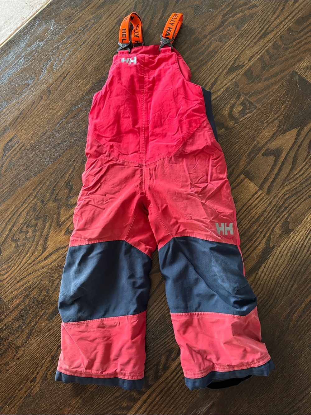 Helly Hansen Kids Red Snow Overalls with Orange Straps and Navy Panels